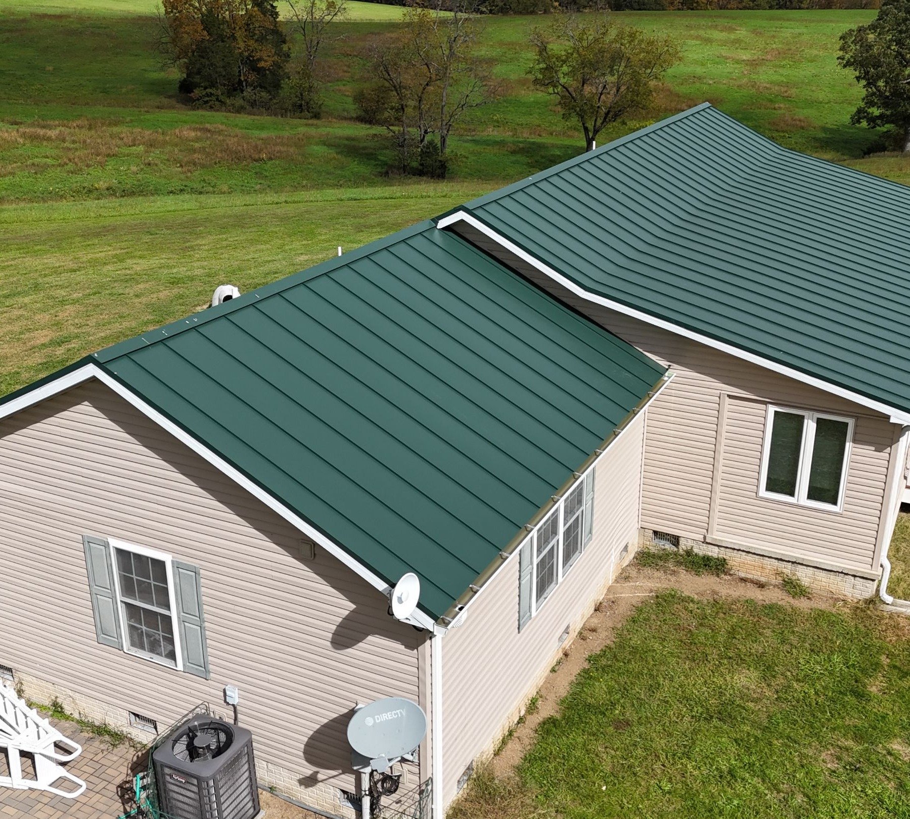 Closeup of green metal roof on house 